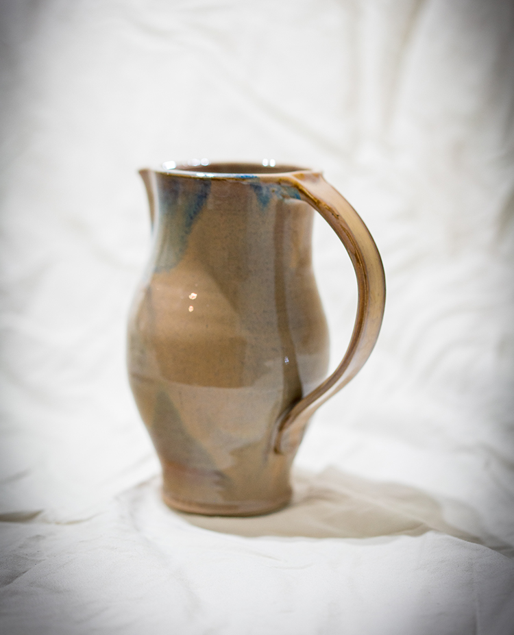 tan stoneware pitcher hand thrown by potter Converse Fields