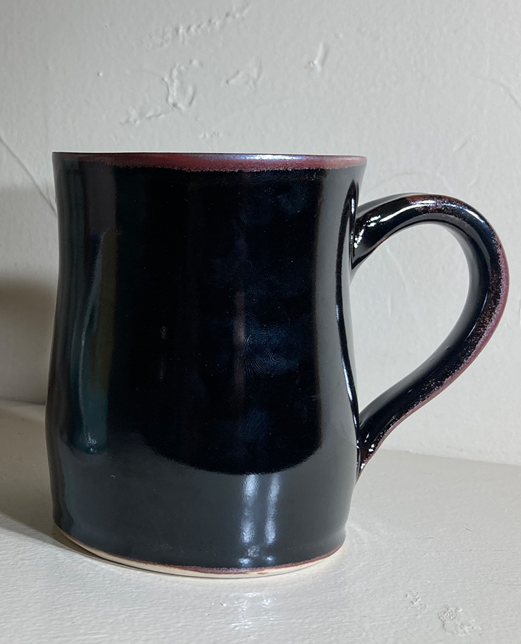 mug in Tenmoku black glaze by Converse Fields for Fields Pottery