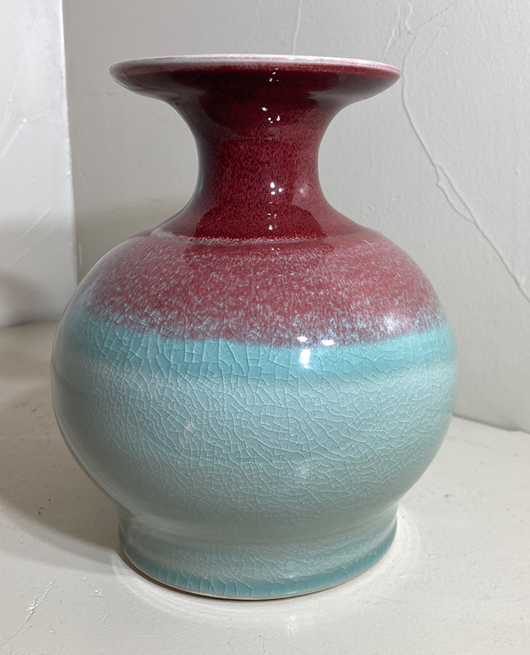 two toned vase in copper red and celadon by Converse Fields for Fields Pottery