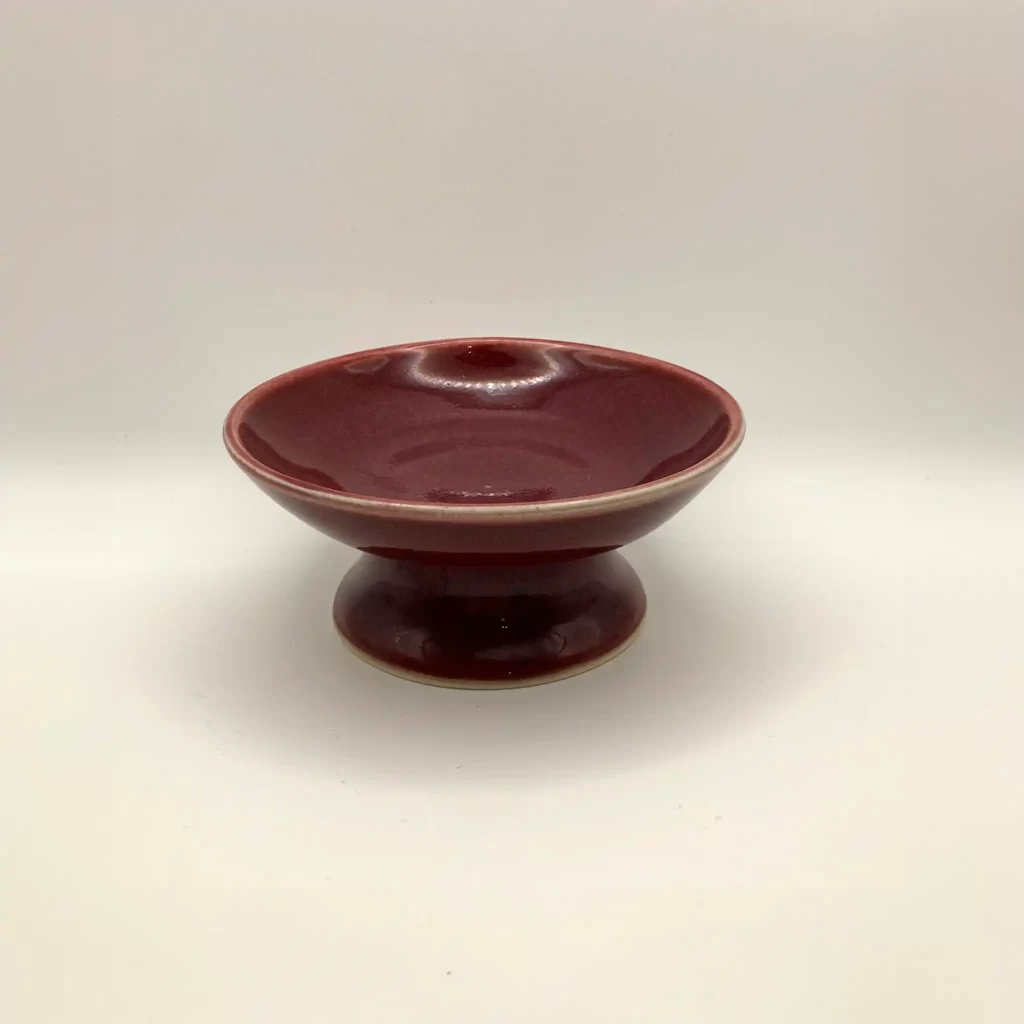 ceramic food bowl for a cat deep red glaze hand thrown by Converse Fields Pottery in Terrebonne Oregon